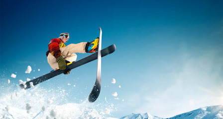 Skiing. Jumping skier. Extreme winter sports.