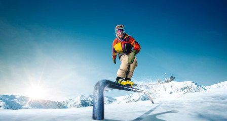 Fototapeta na wymiar Skiing. Jumping skier. Extreme winter sports.