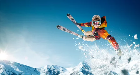 Tuinposter Skiing. Jumping skier. Extreme winter sports. © VIAR PRO studio