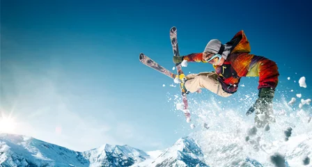 Foto op Plexiglas Skiing. Jumping skier. Extreme winter sports. © VIAR PRO studio