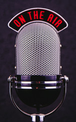 retro microphone on a black background, close-up