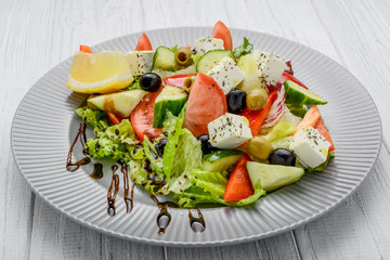 Healthy food, greek salad with vegetables and spices