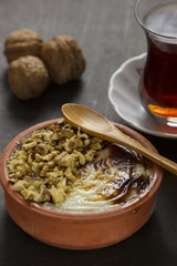turkish desert sutlac rice pudding with hazelnut powder