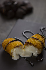 fried ice cream on black background