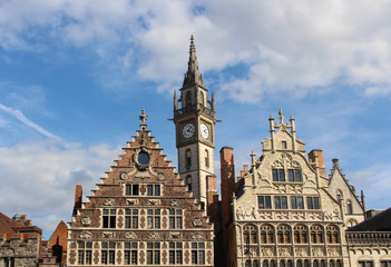 Fototapeta na wymiar View of the House of Grain Measures in the Renaissance style, the House of the Franks-Boatmen in the Gothic style and the tower of Old Post office. Ghent, Belgium.