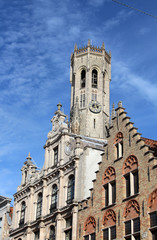 Historical facades and  Bell tower of Belfry of Bruges in the centre of Bruges, Belgium.