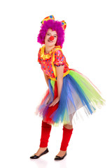 Happy young clown girl on white background