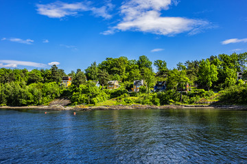 View of Oslo fjord. Colorful Norwegian houses on the shore of Oslo fjord. Norway.