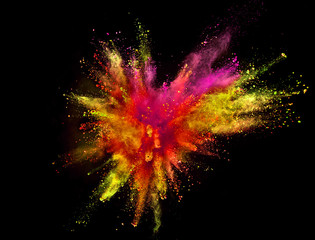 Colored powder explosion on black background.