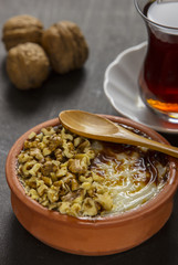 turkish desert sutlac rice pudding with hazelnut powder