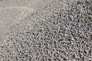 Breakstone background. Road gravel. Gravel texture. Crushed Gravel background. Piles of limestone rocks. Break stones on construction site.