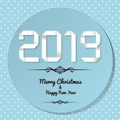 Origami 2019 symbol on a light blue background with polka dots.