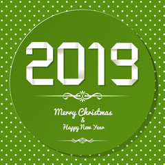 Origami 2019 symbol on a green background with polka dots.