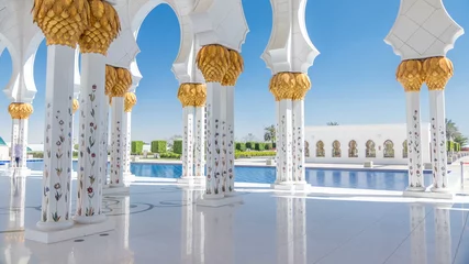 Foto op Plexiglas Sheikh Zayed Grand Mosque timelapse in Abu Dhabi, de hoofdstad van de Verenigde Arabische Emiraten © neiezhmakov