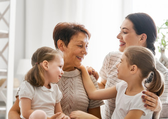 girls, their mother and grandmother