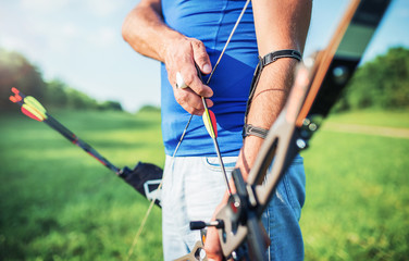 Archer. Sportsman practicing archery. Sport, recreation concept