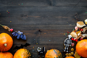 Halloween concept, halloween mood. Pumpkins and cute figures of halloween evils. Skeleton, bats....
