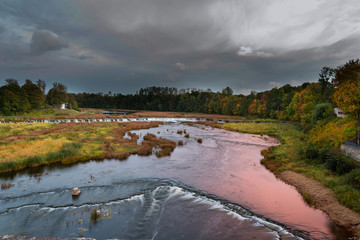 River Venta and waterfall Ventas rumba in evening time. Kuldiga, Latvia.