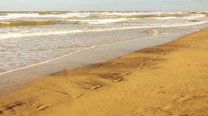 Footprints on the sandy and windy beaches of Ostuni in Salento on the Adriatic sea