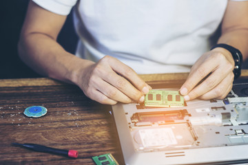 Selective focus Computer repair  and upgrade concept Close-up view. Workshop background