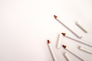White pencils for lip makeup and beauty