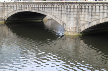 Scenery of designed vintage concrete bridge over the canal.