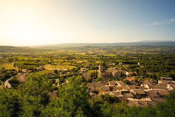 Obraz premium Aerial view of medieval town Bonnieux with surrounding fields, Provence, France