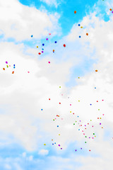 balloons in the sky. many multicolored  balloons launched into the sky