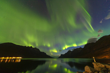 Fototapeta na wymiar The polar lights in Norway. TromsoюErsfjord