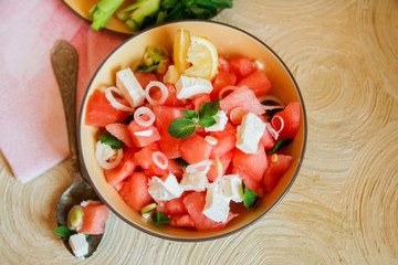 Summer light salad of watermelon, lime, mint and cheese