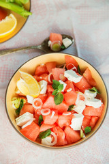 Summer light salad of watermelon, lime, mint and cheese