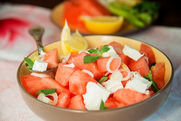 Summer light salad of watermelon, lime, mint and cheese
