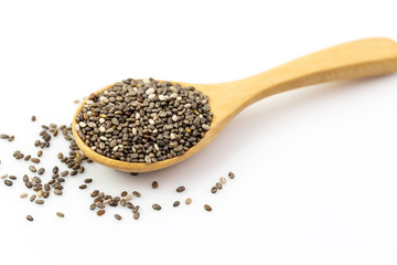 chia seeds in wooden spoon Isolated on white background