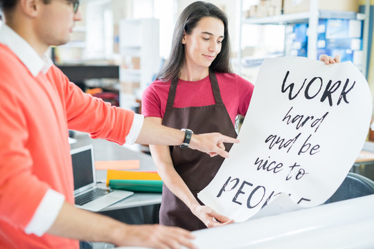 Woman And Man Working In Team In Printing Office And Designing Modern Inspirational Poster 