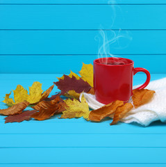  cup of coffee  on wooden blue background.