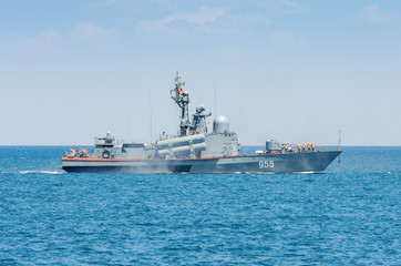 Fototapeta na wymiar A warship in the sea. Russia, the Black Sea. Small missile ship of the Russian navy on the high seas
