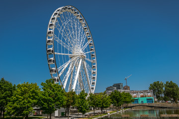 MONTREAL, QUEBEC / CANADA - JULY 15 2018: Ferris wheel of Montreal