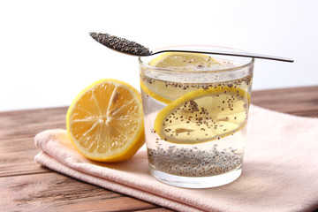 water with chia seeds and lemon in a glass. super food, proper nutrition, healthy supplements