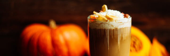 Pumpkin spice latte with whipped cream and caramel