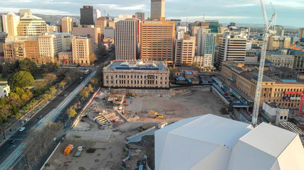 ADELAIDE, AUSTRALIA - SEPTEMBER 16, 2018: Aerial view of city skyline at sunset. Adelaide is the main city of South Australia State