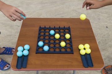 the children play the small balls game in the lesson. back to school. education concept for nursery.