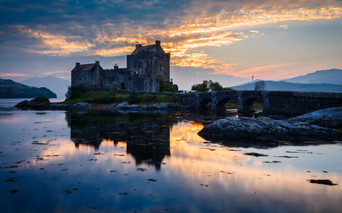 The Eilean Donan Castle  in Kintail region at sunset, Scotland