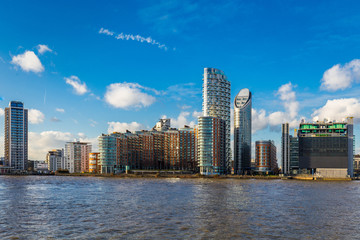 Fototapeta na wymiar Residential towers along Thames in East London