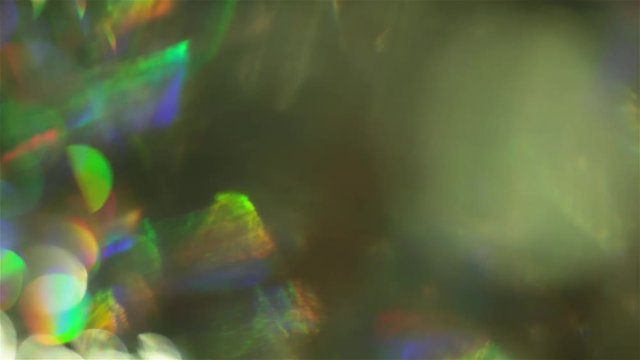 Colorful futuristic bokeh, spectral futuristic colors, holographic iridescent foil.