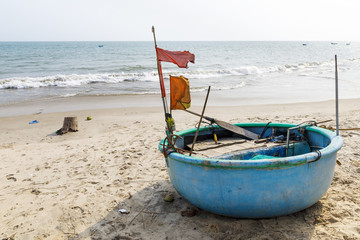 Round fishing boat at seashore in Veitnam