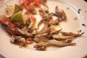 Assorted fried seafood leftovers