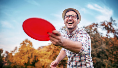 Man playing frisbee. Sport and recreation concept.
