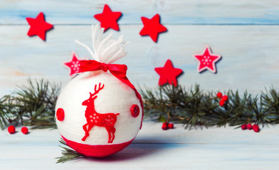 Red Christmas decoration and fir branch