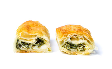 Homemade pie with cheese and spinach isolated