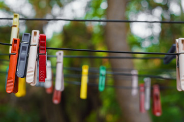Fototapeta na wymiar clothespins on a rope
